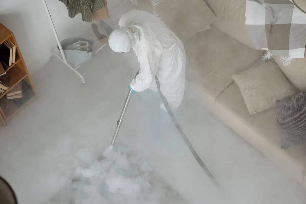 Biohazard cleanup technician in protective equipment, Independence, LA